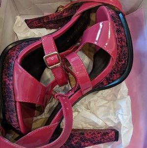 Fushia snakeskin platforms